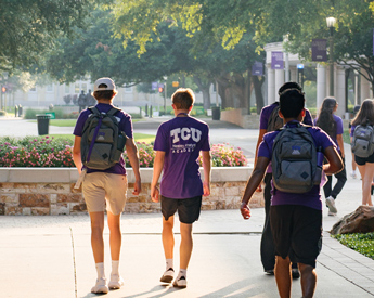 Neeley Analytics Academy pre-college students walking through TCU campus