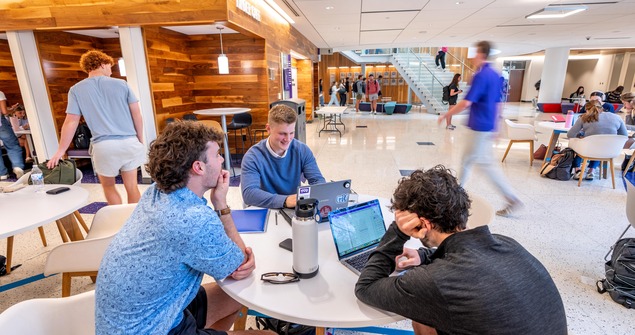 Students studying together in Neeley common area